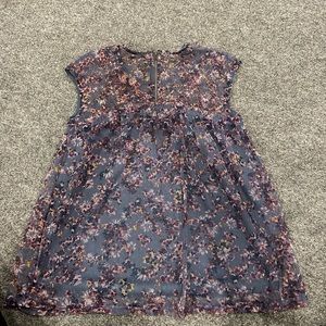 Flowery sleeveless blouse with under shirt attached